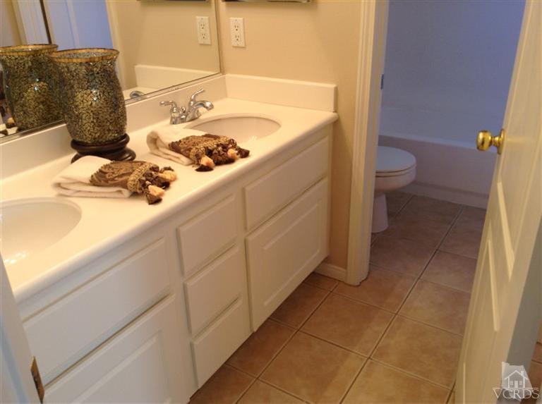 2564 Cloverleaf Lane Simi Valley, CA 93063 - Photo 21 of 30 a bathroom with a sink and toilet