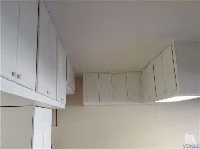 2564 Cloverleaf Lane Simi Valley, CA 93063 - Photo 24 of 30 a view of room with cabinets and a utility room