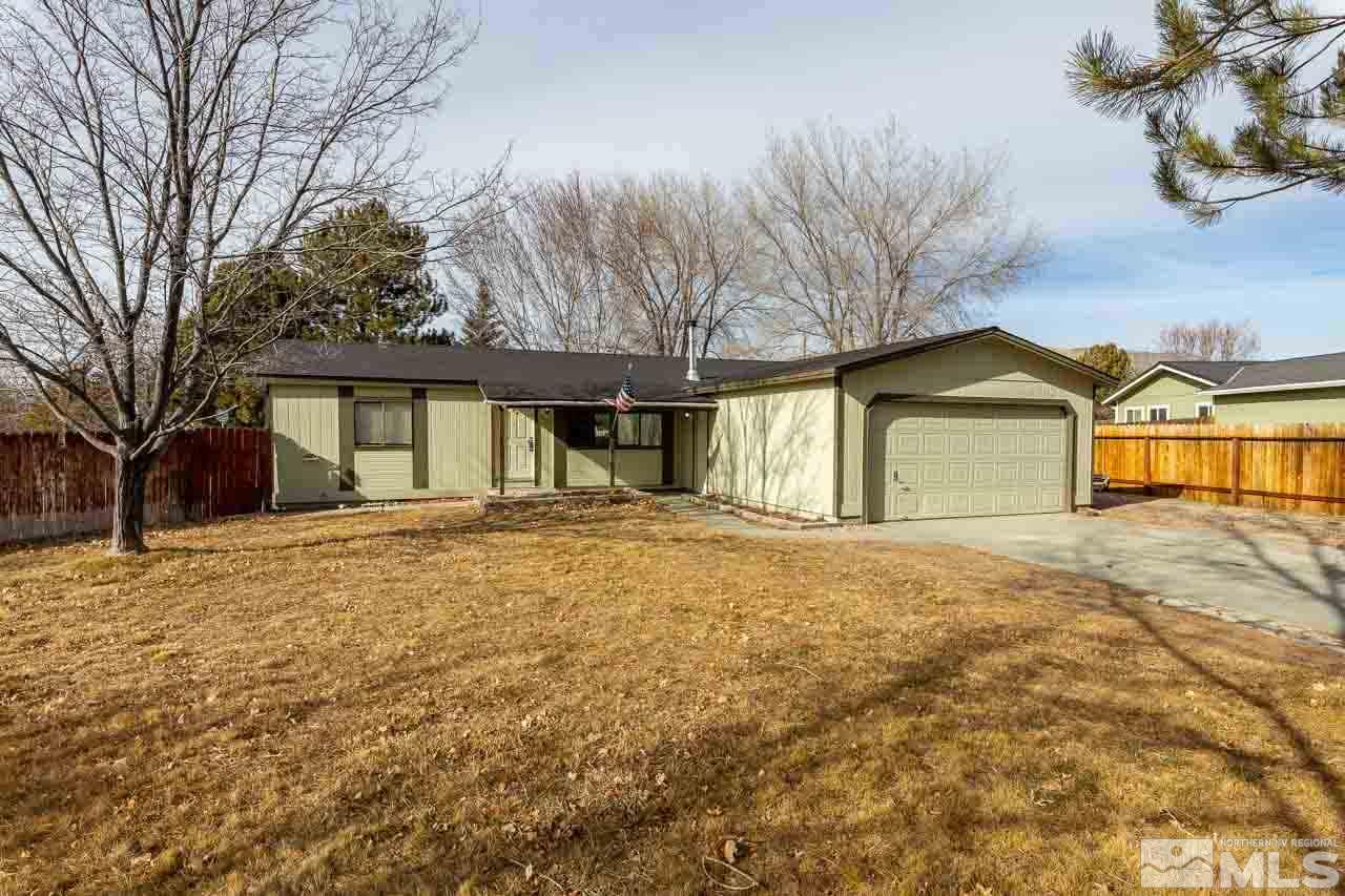 3945 Brant Street Reno, NV 89508 - Photo 3 of 19 a house with trees in front of it