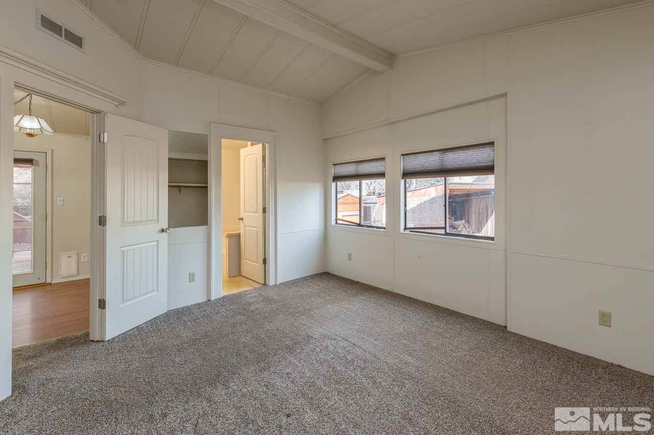 3945 Brant Street Reno, NV 89508 - Photo 8 of 19 an empty room with windows and closet
