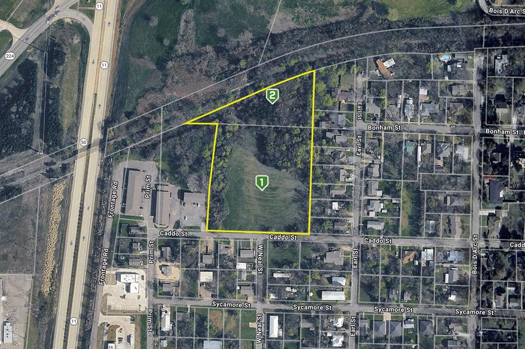 a view of houses with a street