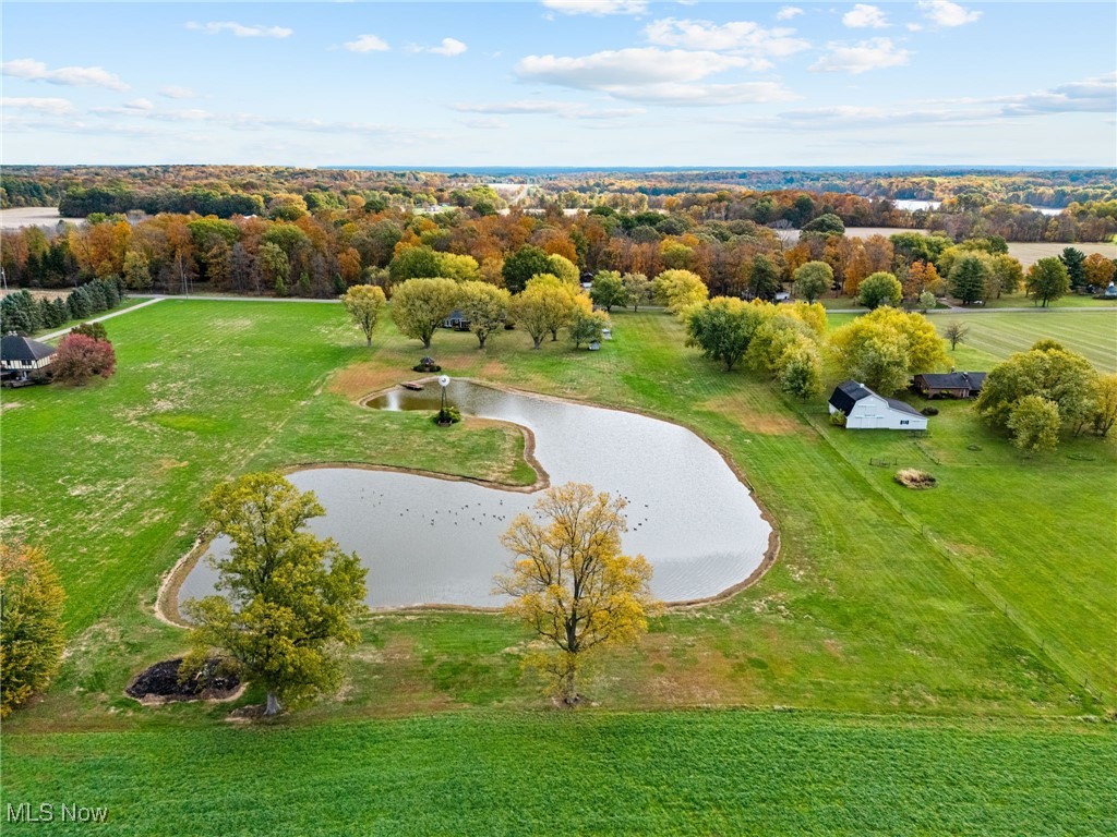 14265 Reeder Avenue Northeast Alliance, OH 44601 - Photo 31 of 39 Drone / aerial view of a nearby body of water and a tree filled landscape