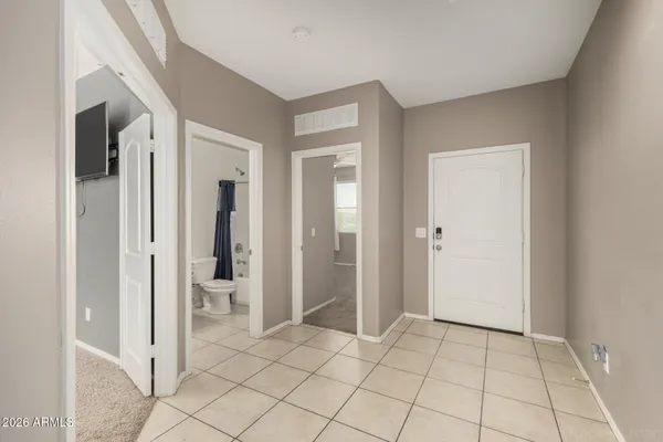 a view of a room with a wardrobe space