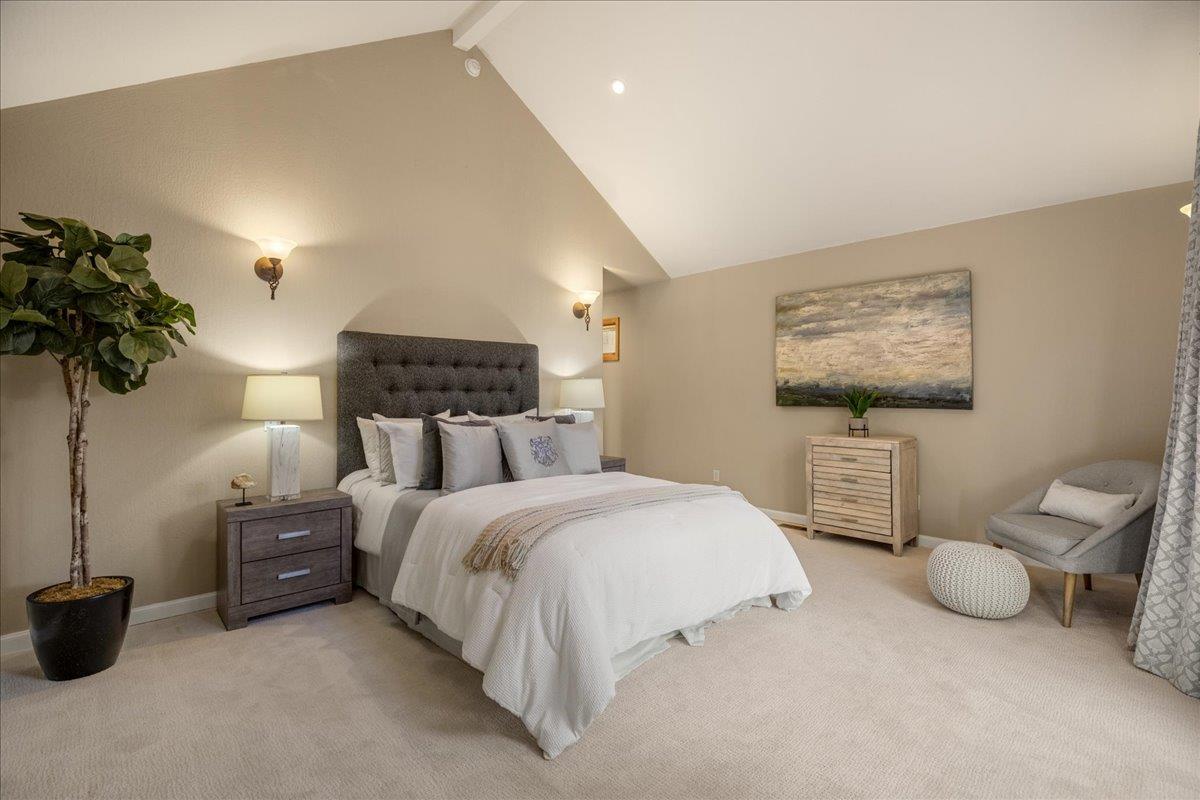 1034 Parma Way Los Altos, CA 94024 - Photo 26 of 49 a bedroom with a bed and a potted plant