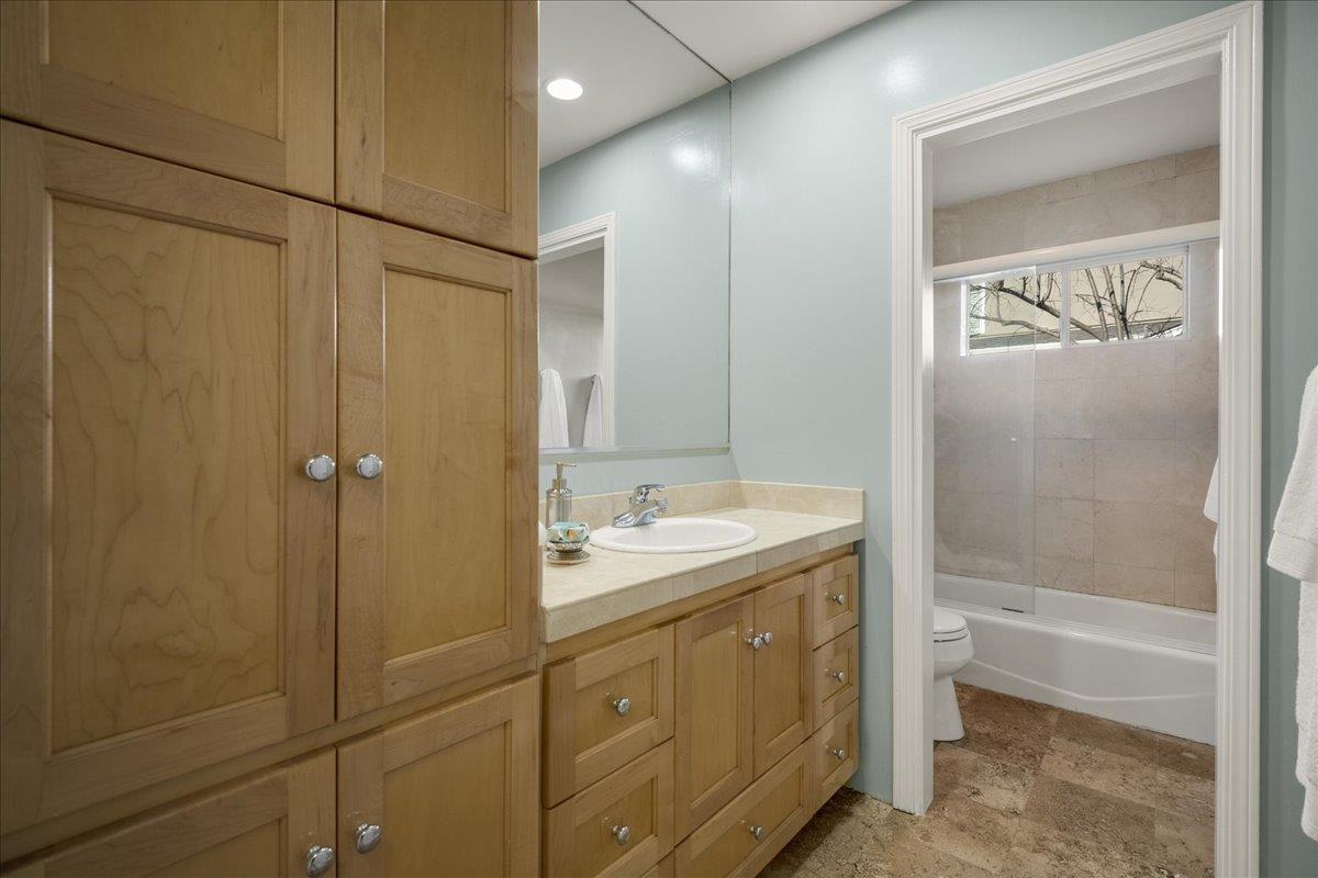 1034 Parma Way Los Altos, CA 94024 - Photo 37 of 49 a bathroom with a granite countertop sink mirror toilet and bathtub