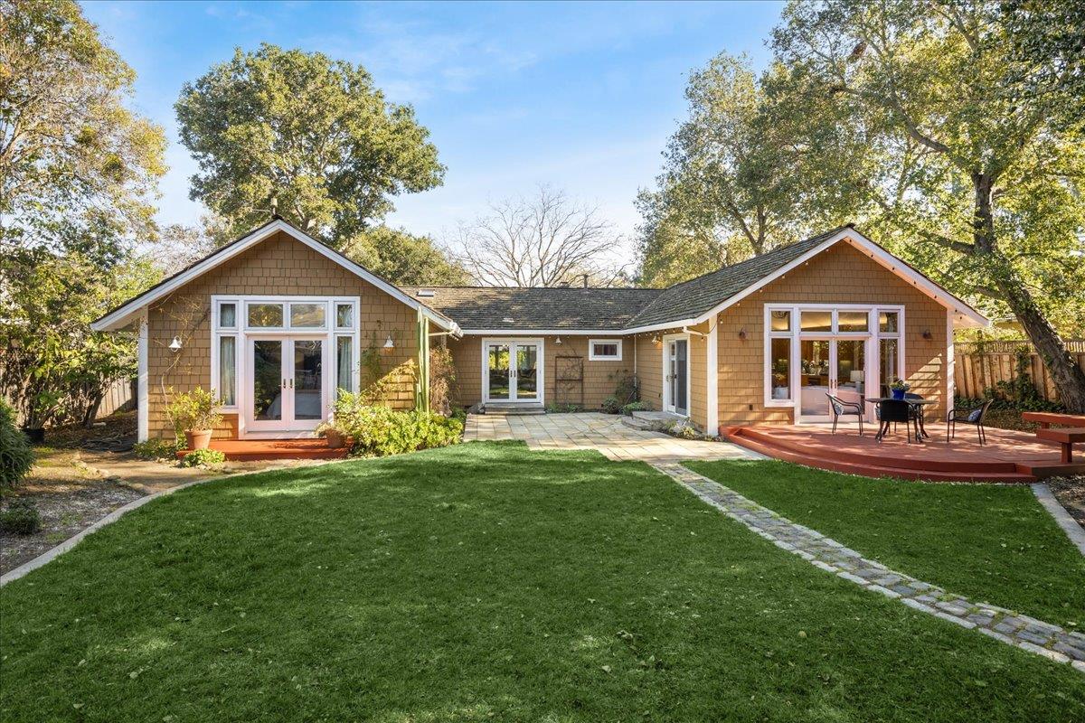 1034 Parma Way Los Altos, CA 94024 - Photo 46 of 49 a front view of a house with a garden and porch