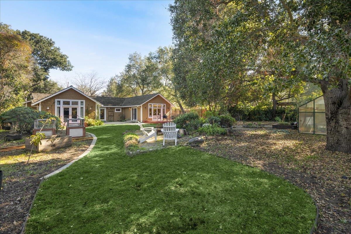 1034 Parma Way Los Altos, CA 94024 - Photo 47 of 49 a front view of a house with garden