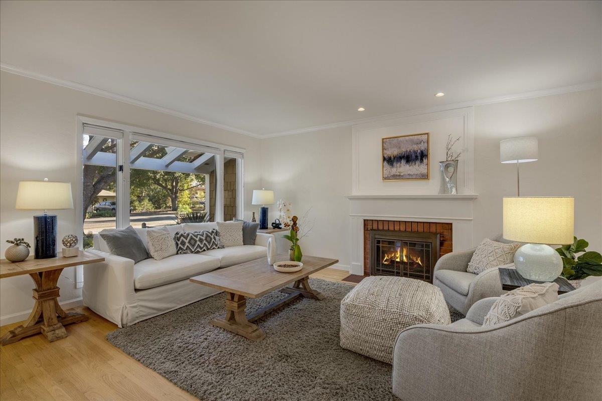 1034 Parma Way Los Altos, CA 94024 - Photo 8 of 49 a living room with furniture and a fireplace
