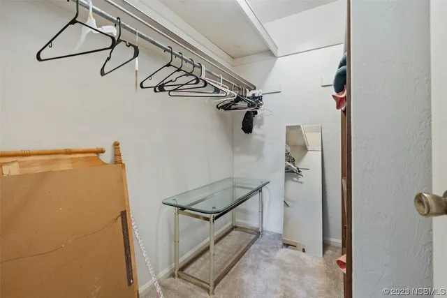 a view of a room with rack on the wall