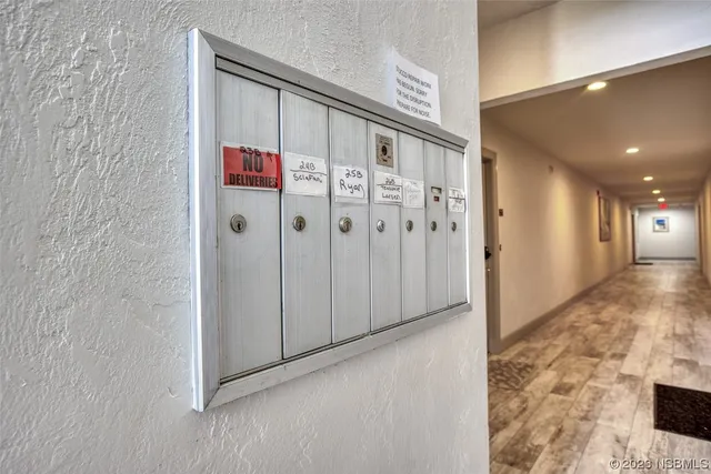 a view of a hallway with closet