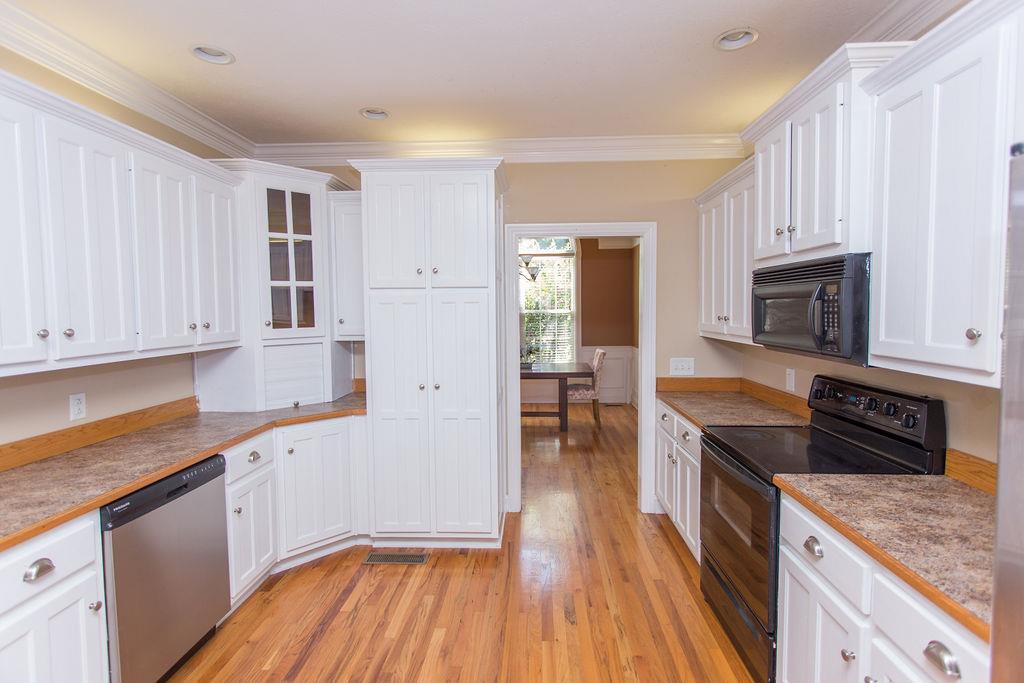 1009 Lake Rise Overlook Gallatin, TN 37066 - Photo 9 of 20 a kitchen with granite countertop a sink cabinets and stainless steel appliances