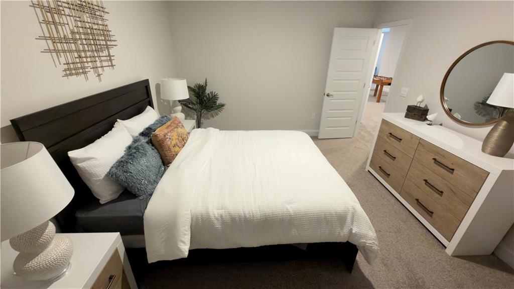 620 Bald Ridge Circle Demorest, GA 30535 - Photo 34 of 43 a bedroom with a bed and a dresser