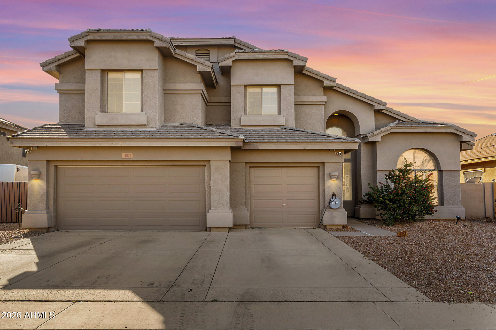 11029 East Decatur Street Mesa, AZ 85207 - Photo 1 of 62 a view of a white house with a outdoor space
