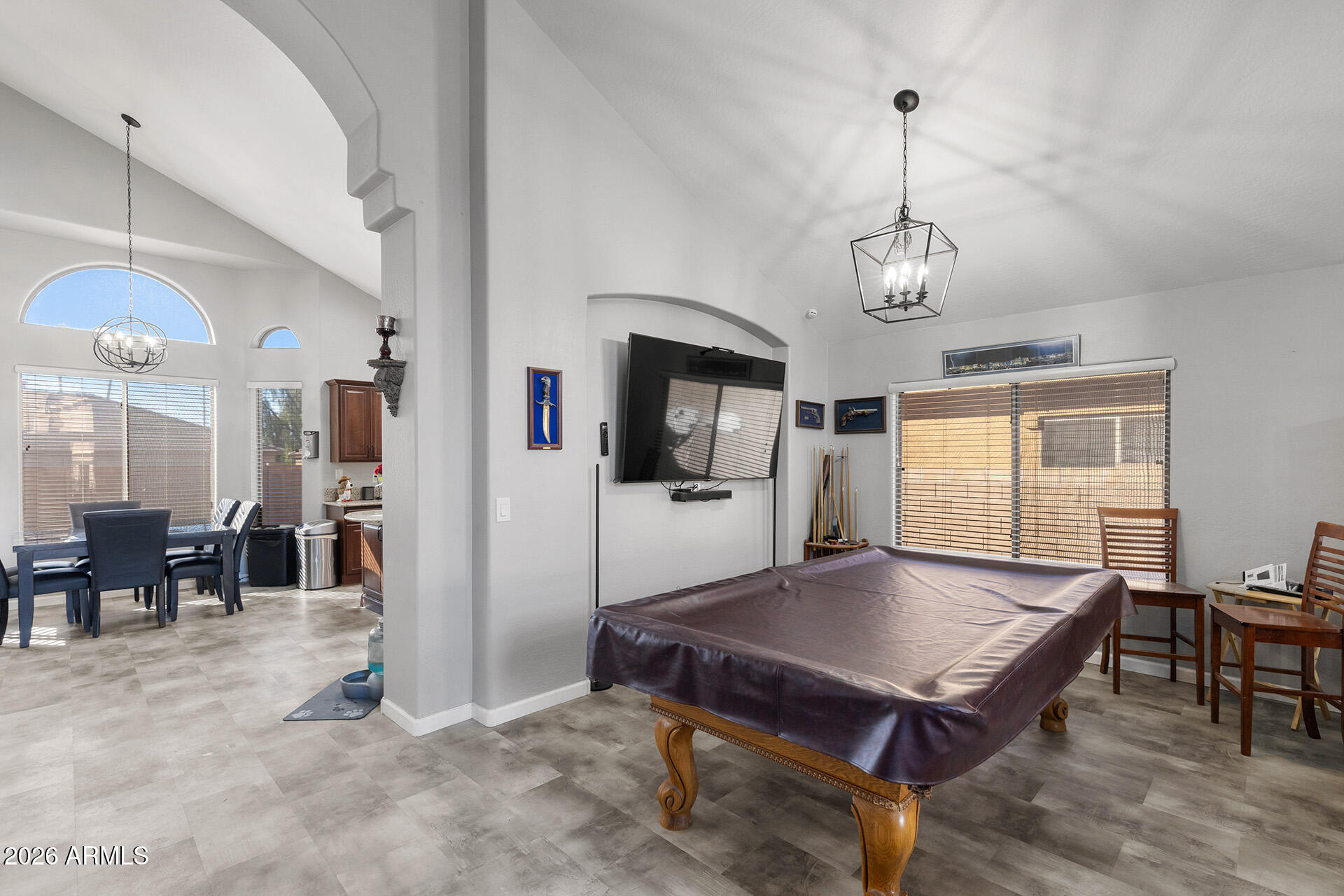 11029 East Decatur Street Mesa, AZ 85207 - Photo 19 of 62 a living room with a table chairs and a dining table