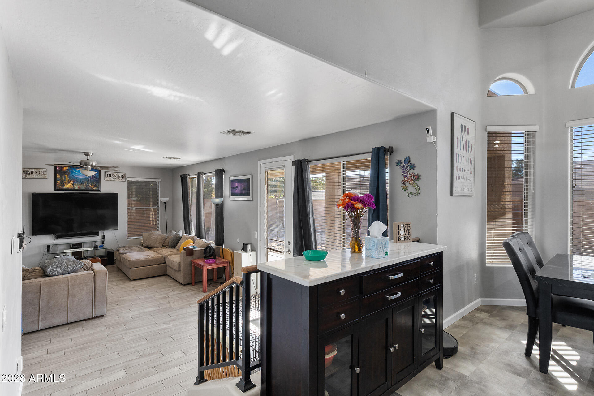 11029 East Decatur Street Mesa, AZ 85207 - Photo 22 of 62 a room with a large window and gym equipment