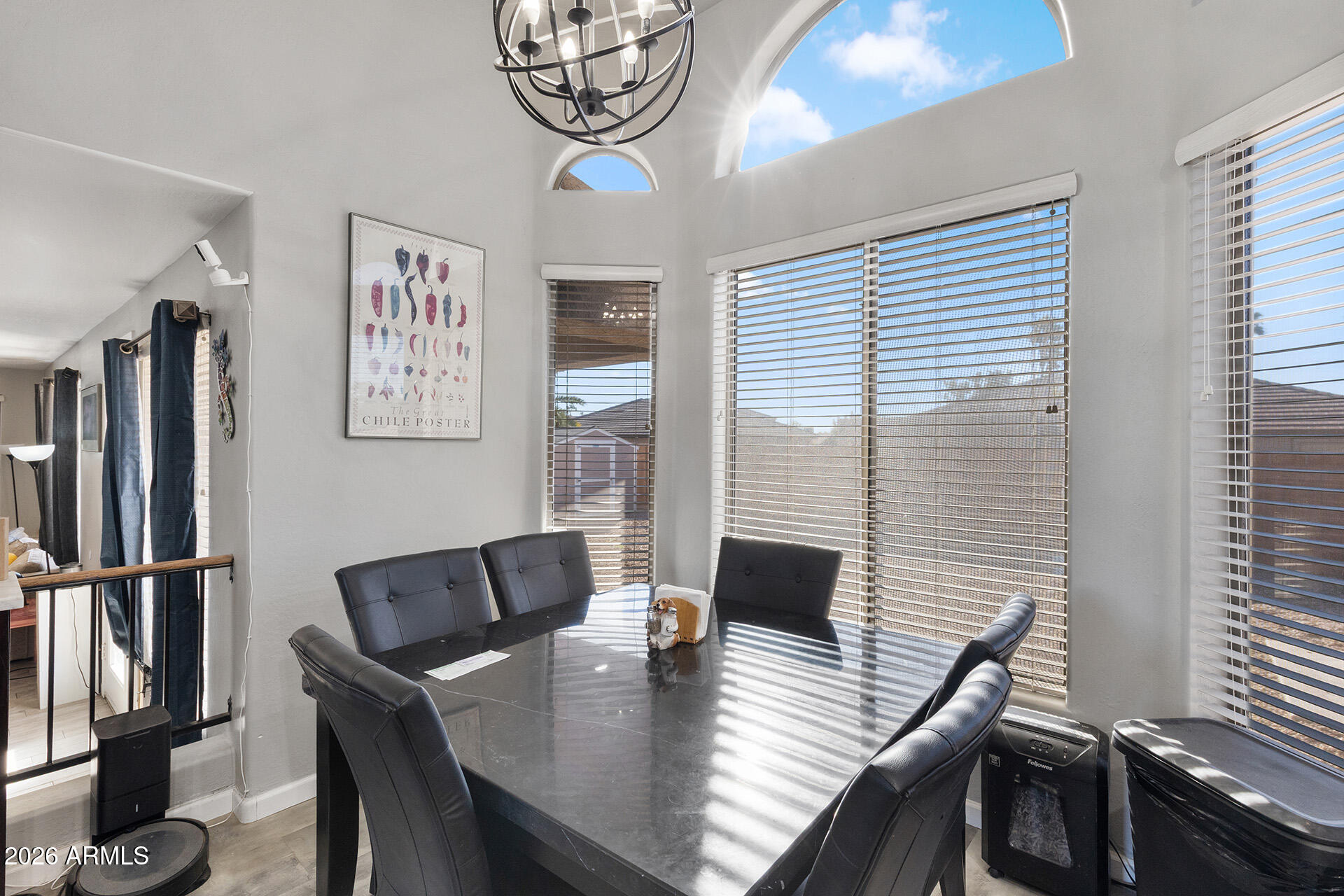 11029 East Decatur Street Mesa, AZ 85207 - Photo 27 of 62 a view of a dining room with furniture window and wooden floor