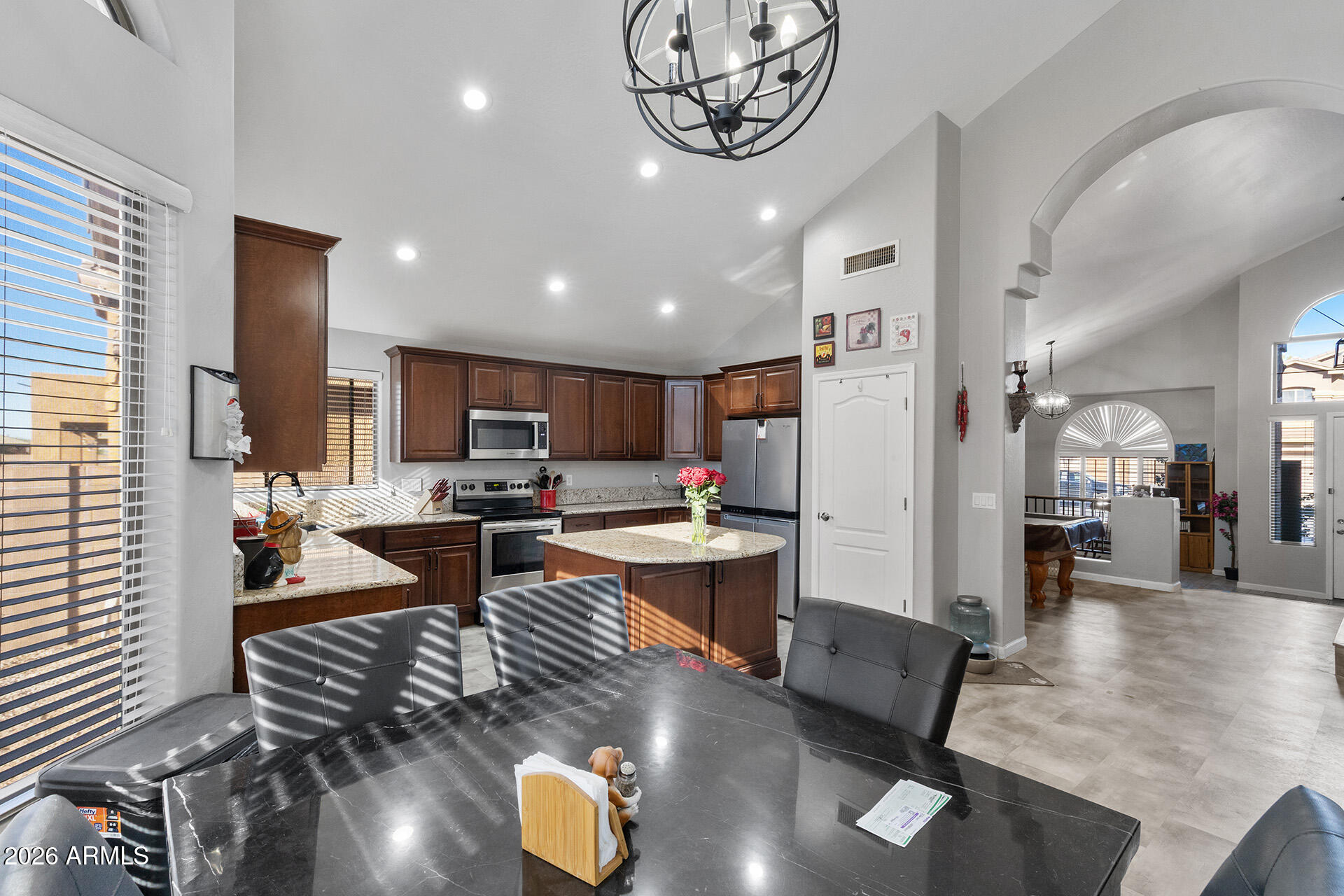 11029 East Decatur Street Mesa, AZ 85207 - Photo 28 of 62 a living room with lots of furniture and kitchen view