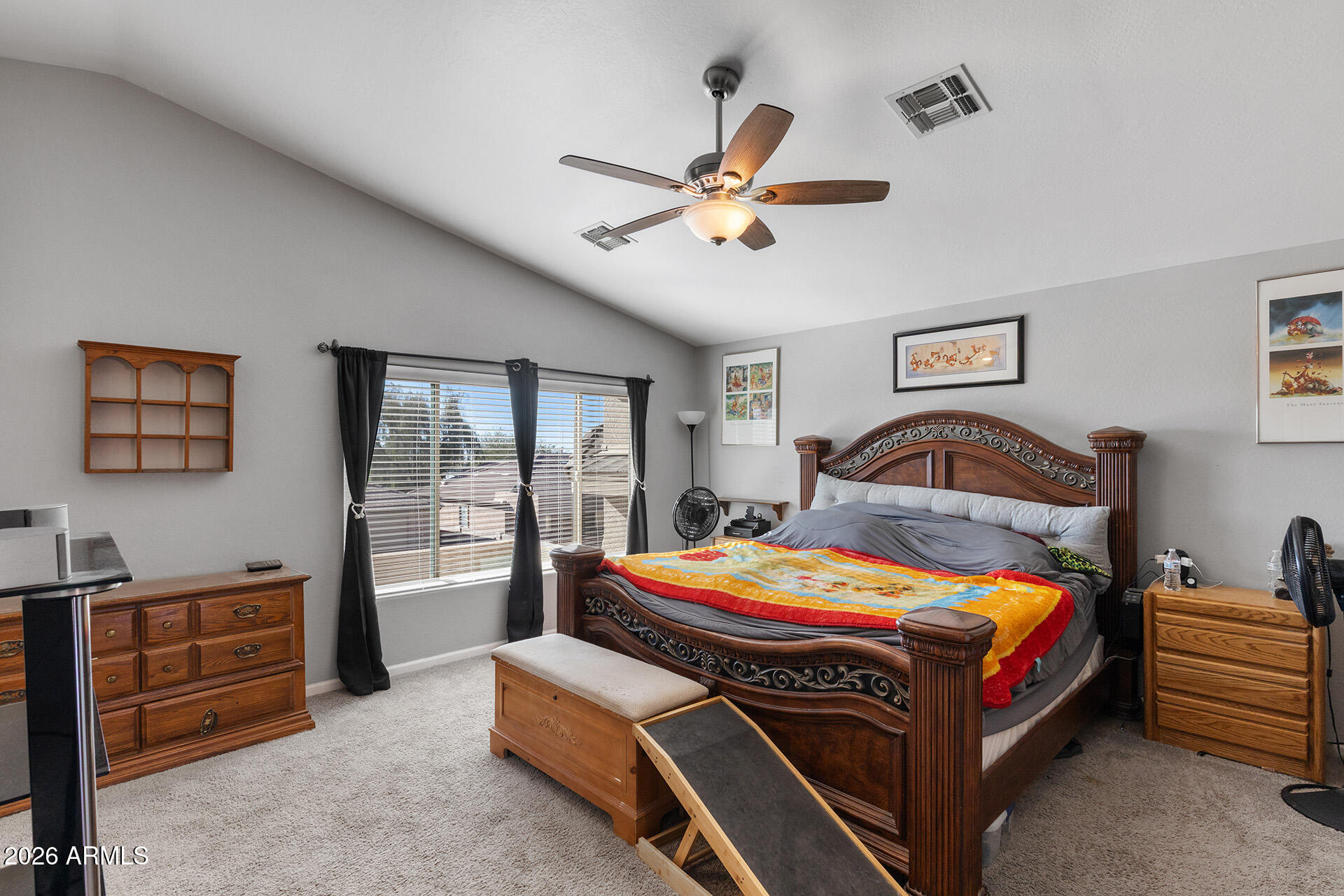 11029 East Decatur Street Mesa, AZ 85207 - Photo 35 of 62 a bedroom with a bed and a chandelier