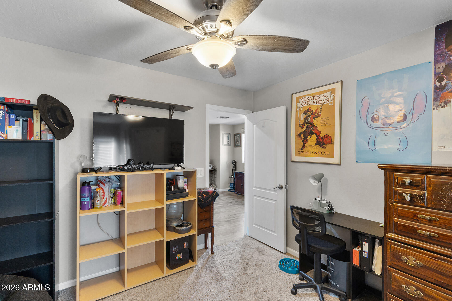 11029 East Decatur Street Mesa, AZ 85207 - Photo 38 of 62 a living room with furniture and a flat screen tv