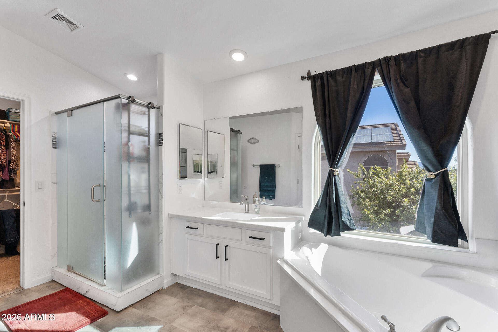 11029 East Decatur Street Mesa, AZ 85207 - Photo 42 of 62 a bathroom with a double vanity sink mirror and shower