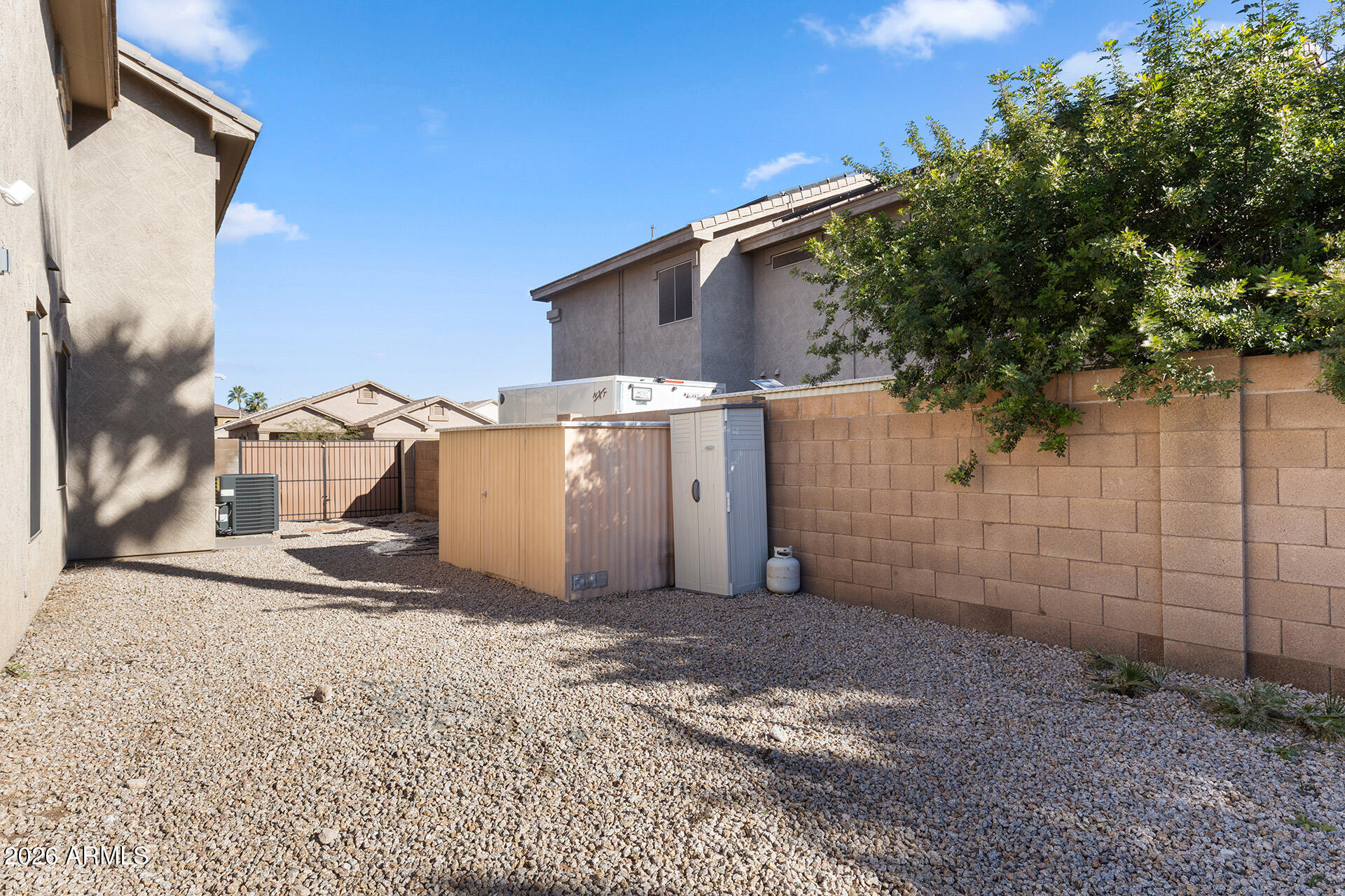 11029 East Decatur Street Mesa, AZ 85207 - Photo 55 of 62 a view of a house with a snow in the yard