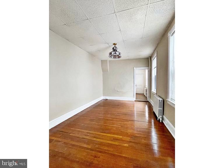 1110 Maple Street Wilmington, DE 19805 - Photo 3 of 10 a view of an empty room with a window
