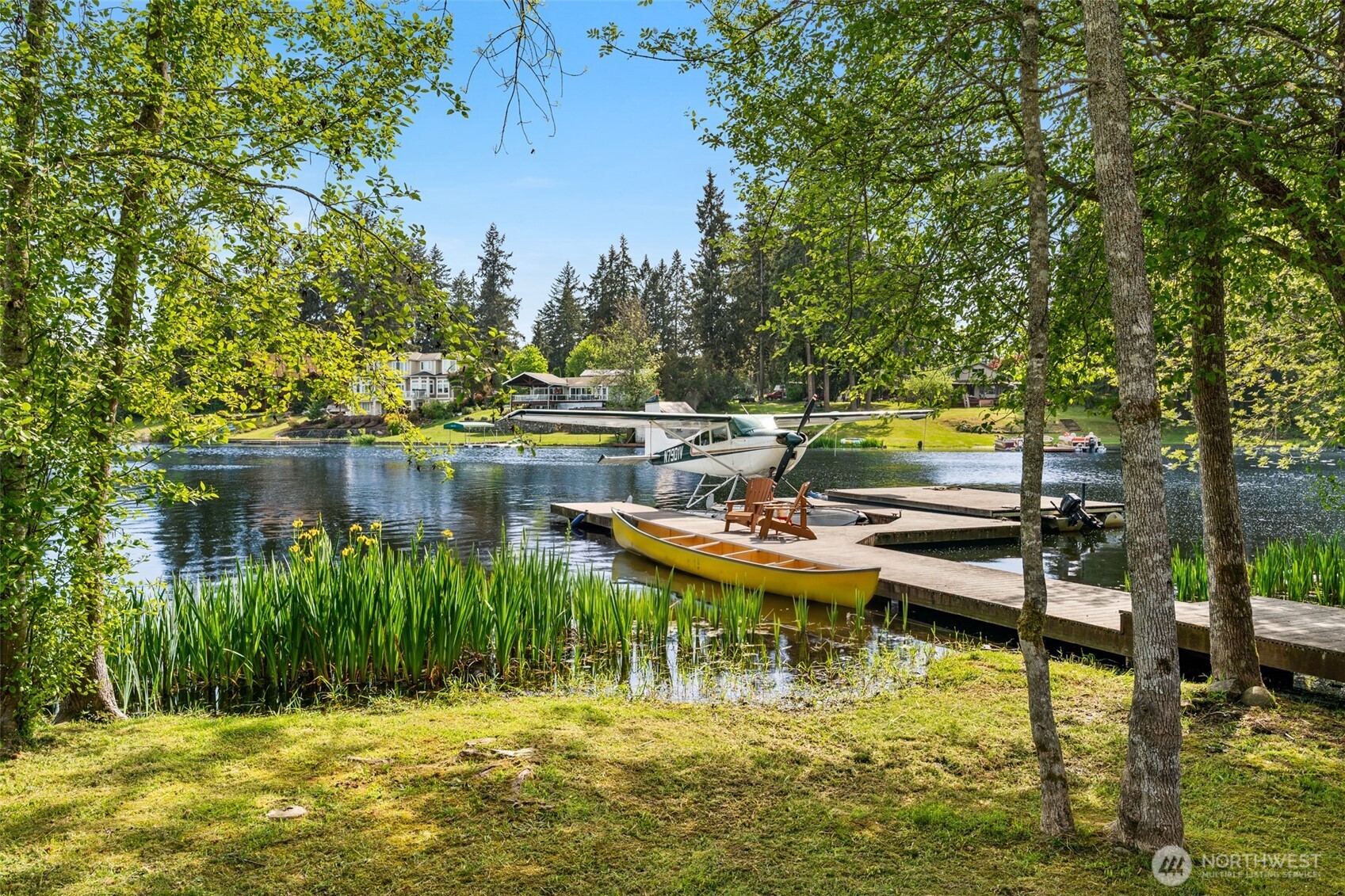 1000 Creso Road South Spanaway, WA 98387 - Photo 4 of 40 a view of swimming pool with lawn chairs and plants