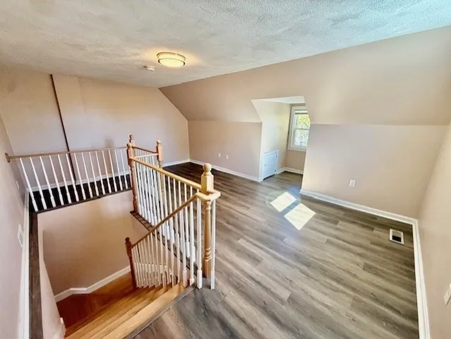 a view of entryway with wooden floor