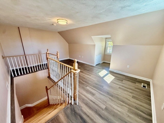 400 Massachusetts Avenue, Unit 4 Arlington, MA 02474 - Photo 16 of 20 a view of entryway with wooden floor