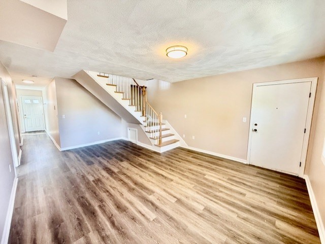 400 Massachusetts Avenue, Unit 4 Arlington, MA 02474 - Photo 10 of 20 a view of a room with wooden floor