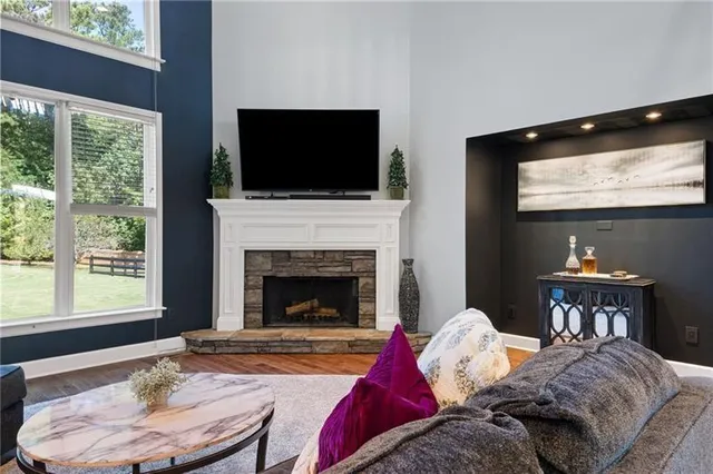 a bathroom with a sink vanity mirror and toilet