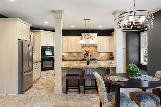 a bed room with a bed and a large window