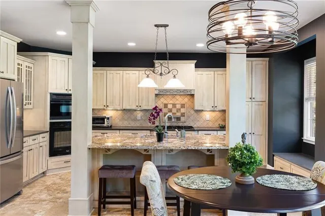 a bedroom with a bed and a view of kitchen