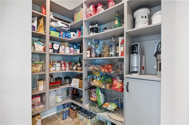 a bathroom with a sink double vanity and a mirror