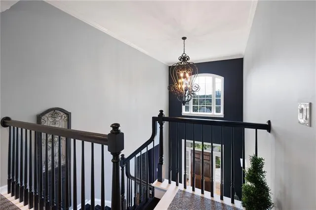 a living room with furniture a ceiling fan and a rug