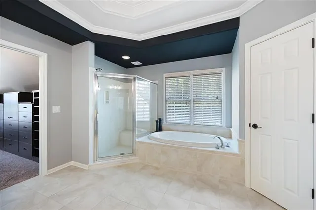 a view of a house with a yard patio and swimming pool