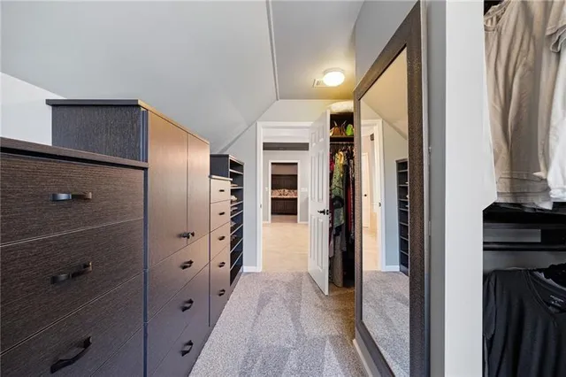 a view of a backyard with sitting area