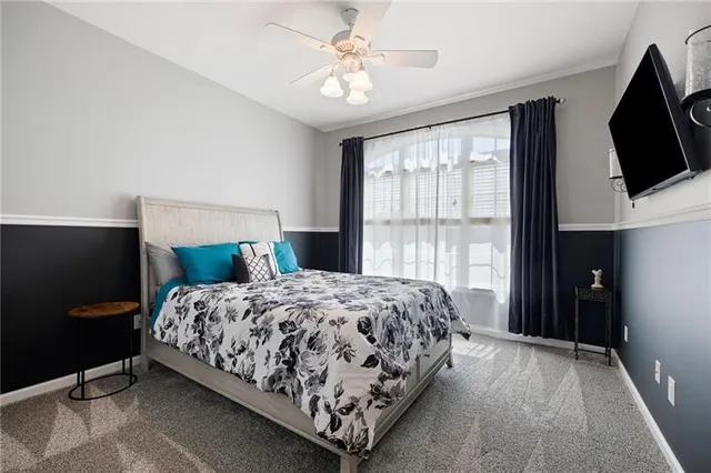 an aerial view of a house with a yard and garden