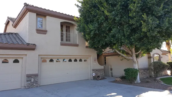 a view of front of house with garage