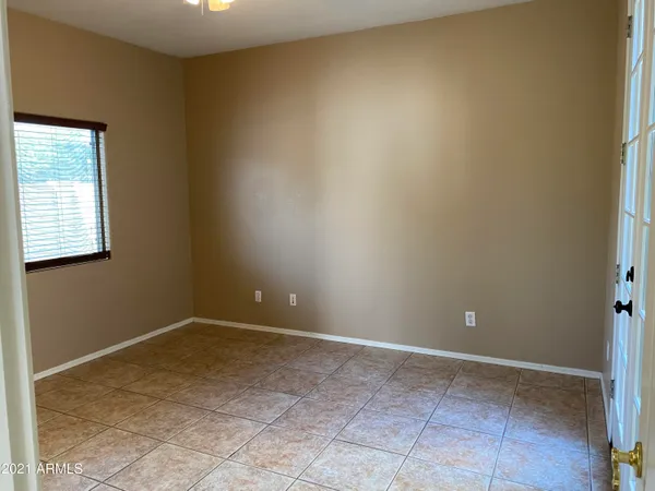 a white toilet sitting next to a bath tub