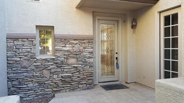 a view of balcony with wooden floor