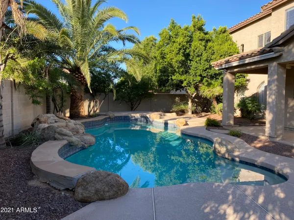 a view of a table and chair in the patio
