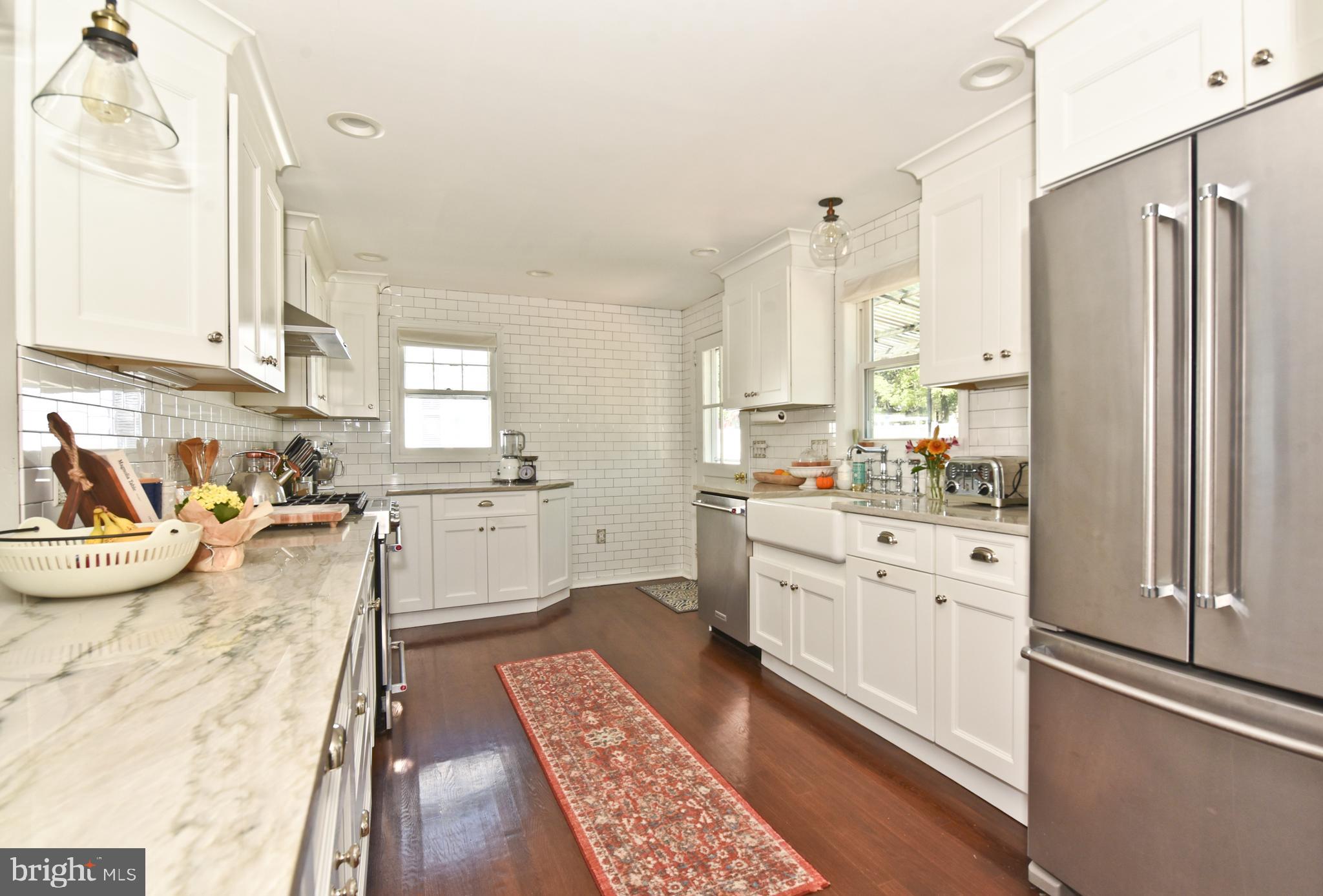 132 Roxboro Road Trenton, NJ 08648 - Photo 10 of 25 Kitchen with wall of subway tile