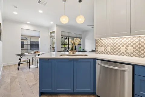 a bathroom with a sink and a large mirror