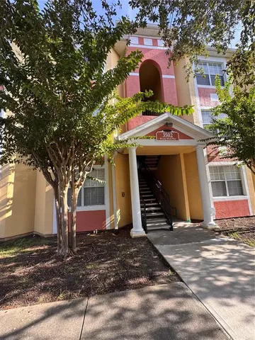 a front view of a house with garage