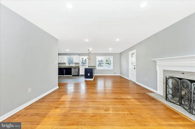 a view of livingroom with furniture and large window