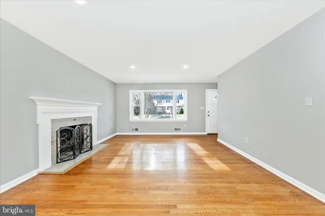 a kitchen with stainless steel appliances a refrigerator sink and stove