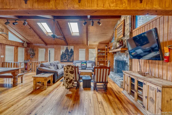 a kitchen view with table and chairs