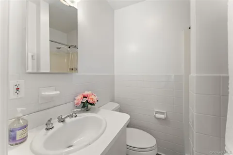 a spacious bedroom with a bed and window