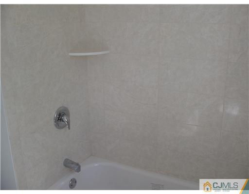 135 Midfield Road Colonia, NJ 07067 - Photo 15 of 18 a close view of a shower